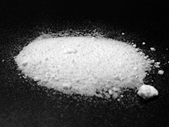 Photo:Ammonium Perrhenate (White powder)